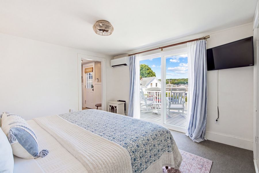 King bed and the balcony doors
